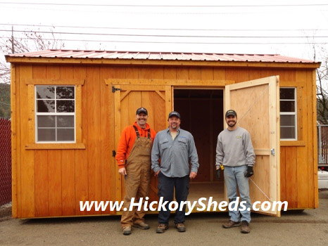 A group of men happy with their new Hickory Shed
