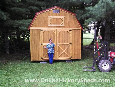 A woman happy with her new Hickory Shed